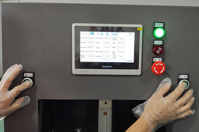 伺服压力机双启动按钮的作用